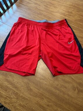 Nike Men’s Red Athletic Shorts with Black Panels and Silver Swoosh